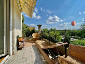 Villa with terrace overlooking the city park